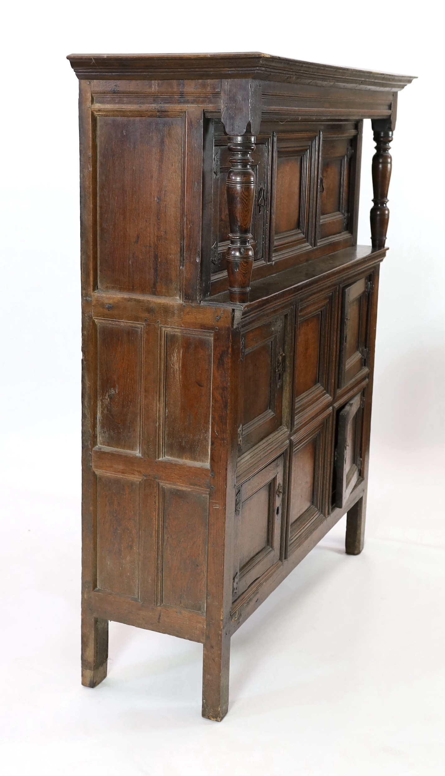 A mid 18th century oak cupboard, W.146cm D.51cm H.175cm
